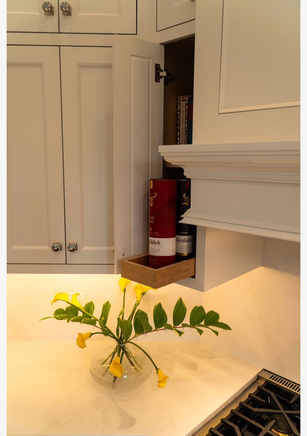 Marble counter and white cabinetry detail